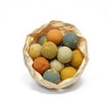 Handmade seed bomb gift box containing 12 assorted colorful wildflower clay balls